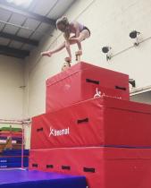 A girl doing a gymnastic move