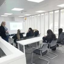 Pupils in a classroom doing work at their desks