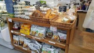 Shelves promoting ethically sourced foods and organic eggs